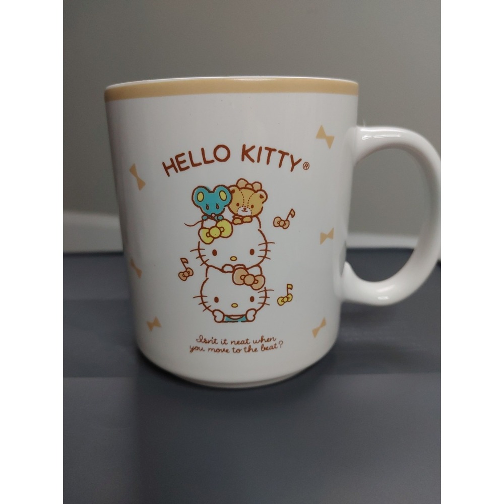Miniso Sanrio Hello Kitty Ceramic Mug "Isn't it neat when you move to the beat?"